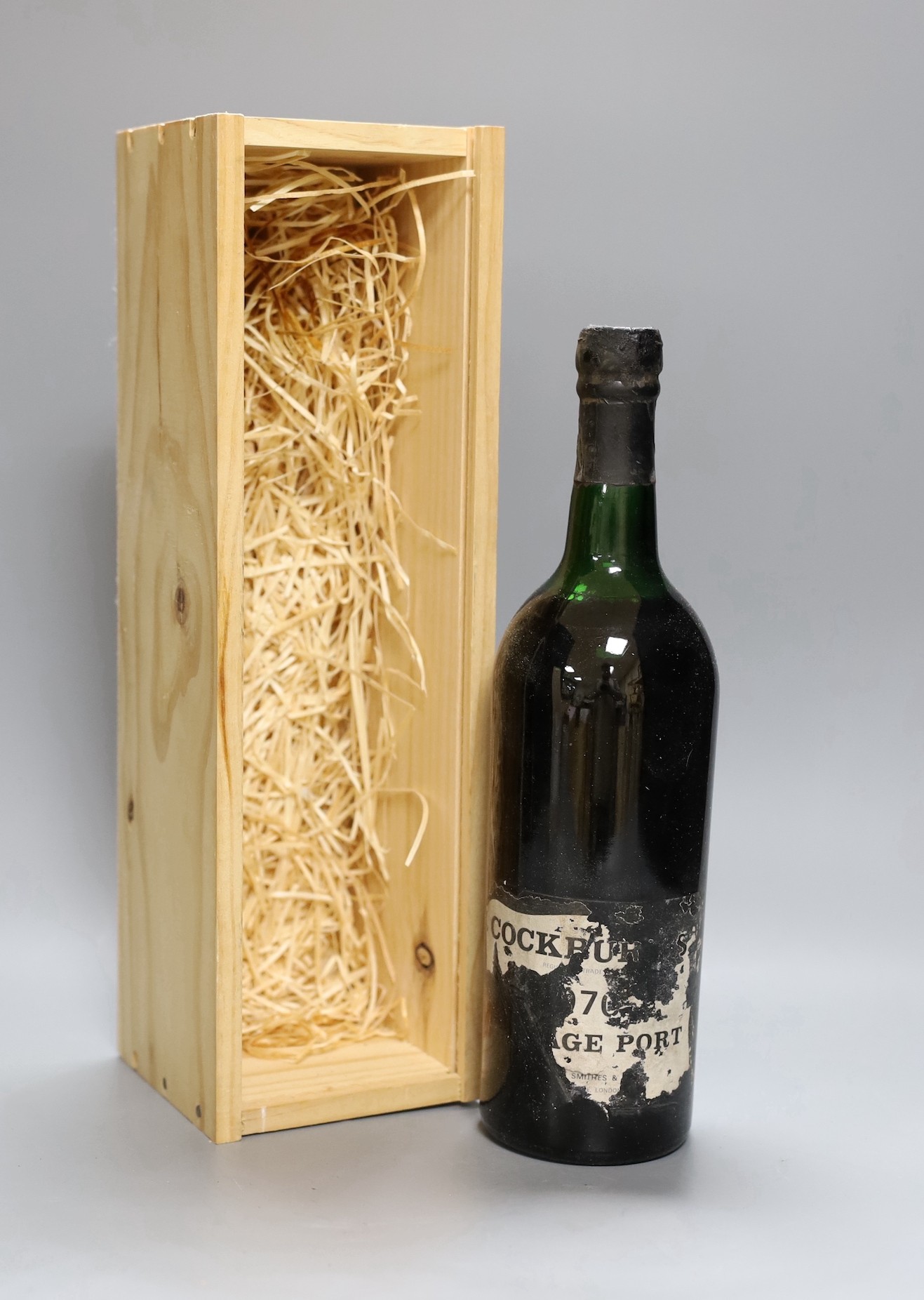 A cased bottle of Cockburns 1970 vintage port.